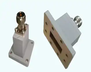 What are the performance parameters of the end - launch waveguide to coaxial adapter?